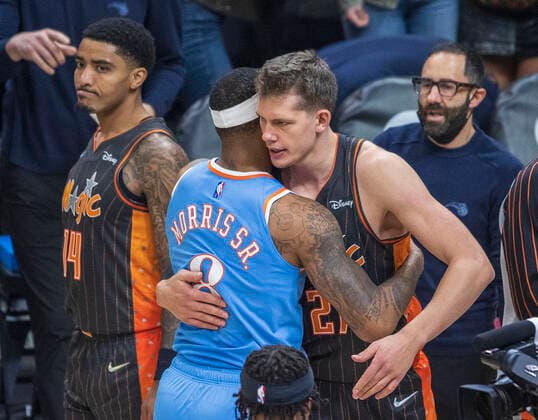 December 11, 2021, Los Angeles, California, USA: Moe Wagner 21 of the Orlando Magic chats with Marcus Morris 8 of the Los Angeles Clippers after their NBA, Basketball Herren, USA game on Saturday December 11, 2021 at the Staples Center in Los Angeles, California. Clippers defeat Magic, 106-104. PI Los Angeles USA - ZUMAp124 20211211_zaa_p124_033 Copyright: xARIANAxRUIZx