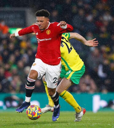 Norwich City v Manchester United, ManU Premier League Jadon Sancho of Manchester United and Kenny McLean of Norwich in action during the Premier League match at Carrow Road, Norwich Content Not Available For UK Newspapers Copyright: xPaulxChestertonx FIL-16251-0195