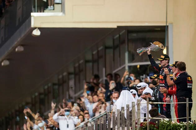 December 12, 2021, Abu Dhabi, United Arab Emirates: MAX VERSTAPPEN of the Netherlands and Red Bull Racing on the podium after winning the 2021 FIA Formula 1 Abu Dhabi Grand Prix and the 2021 Formula 1 World Championship, WM, Weltmeisterschaft at Yas Marina Circuit in Abu Dhabi, United Arab Emirates. Abu Dhabi United Arab Emirates - ZUMAg147 20211212_zap_g147_029 Copyright: xJamesxGasperottix