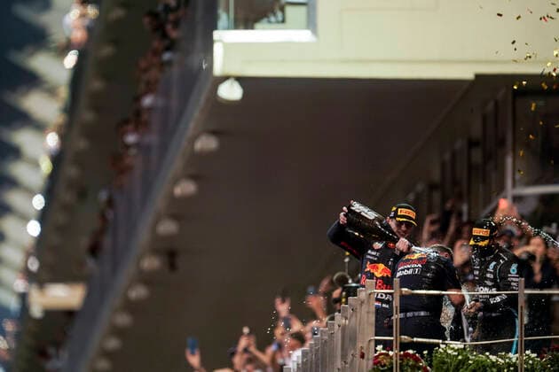December 12, 2021, Abu Dhabi, United Arab Emirates: MAX VERSTAPPEN of the Netherlands and Red Bull Racing on the podium after winning the 2021 FIA Formula 1 Abu Dhabi Grand Prix and the 2021 Formula 1 World Championship, WM, Weltmeisterschaft at Yas Marina Circuit in Abu Dhabi, United Arab Emirates. Abu Dhabi United Arab Emirates - ZUMAg147 20211212_zap_g147_030 Copyright: xJamesxGasperottix