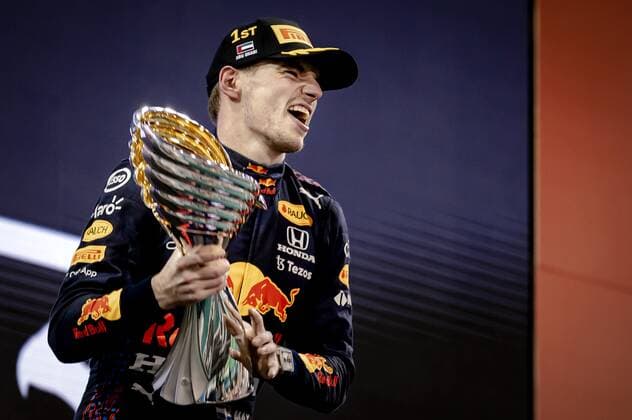 ABU DHABI - Red Bull Racing s Max Verstappen on the podium after winning the Formula 1 World Championship, WM, Weltmeisterschaft after the Abu Dhabi Grand Prix at Yas Marina Circuit on December 12, 2021 in Abu Dhabi, United Arab Emirates. REMKO DE WAAL F1 Grand Prix 2021 xVIxANPxSportx xxANPxIVx