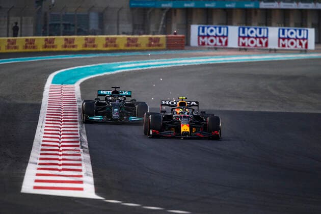 11 Sergio Perez (MEX, Red Bull Racing), 44 Lewis Hamilton (GBR, Mercedes-AMG Petronas F1 Team), F1 Grand Prix of Abu Dhabi at Yas Marina Circuit on December 12, 2021 in Abu Dhabi, United Arab Emirates. (Photo by HOCH ZWEI) Abu Dhabi United Arab Emirates