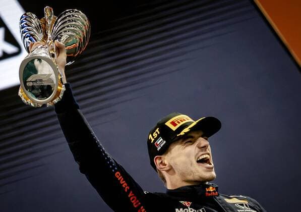 ABU DHABI - Red Bull Racing s Max Verstappen on the podium after winning the Formula 1 World Championship, WM, Weltmeisterschaft after the Abu Dhabi Grand Prix at Yas Marina Circuit on December 12, 2021 in Abu Dhabi, United Arab Emirates. REMKO DE WAAL F1 Grand Prix 2021 xVIxANPxSportx xxANPxIVx