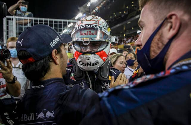 33 Max Verstappen (NED, Red Bull Racing) celebrates becoming the 2021 Drivers World Champion with 11 Sergio Perez (MEX, Red Bull Racing), F1 Grand Prix of Abu Dhabi at Yas Marina Circuit on December 12, 2021 in Abu Dhabi, United Arab Emirates. (Photo by HOCH ZWEI) Abu Dhabi United Arab Emirates