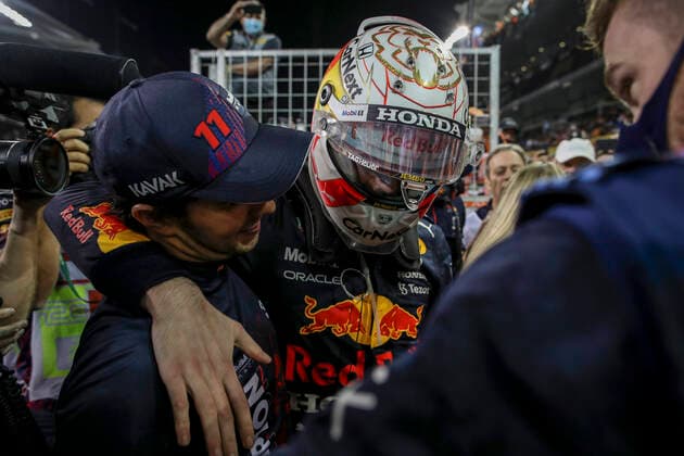 33 Max Verstappen (NED, Red Bull Racing) celebrates becoming the 2021 Drivers World Champion with 11 Sergio Perez (MEX, Red Bull Racing), F1 Grand Prix of Abu Dhabi at Yas Marina Circuit on December 12, 2021 in Abu Dhabi, United Arab Emirates. (Photo by HOCH ZWEI) Abu Dhabi United Arab Emirates