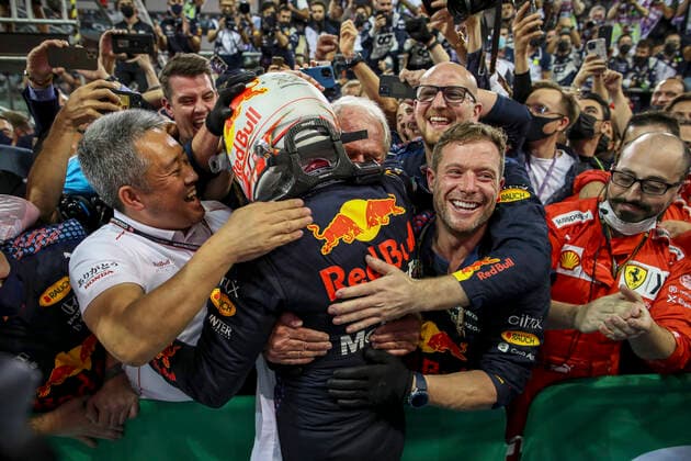 33 Max Verstappen (NED, Red Bull Racing) celebrates becoming the 2021 Drivers World Champion with Masashi Yamamoto (JPN, F1 General Manager Honda), Dr. Helmut Marko (AUT, Red Bull Racing), F1 Grand Prix of Abu Dhabi at Yas Marina Circuit on December 12, 2021 in Abu Dhabi, United Arab Emirates. (Photo by HOCH ZWEI) Abu Dhabi United Arab Emirates