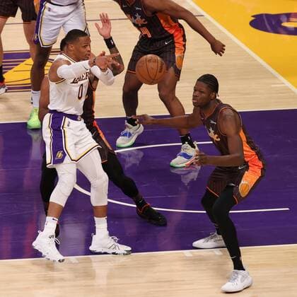 Russell Westbrook (L) of the Lakers passes the ball to a teammate during an NBA, Basketball Herren, USA game between the Los Angeles Lakers and the Orlando Magic, at the Crypto.com Center in Los Angeles, USA, 12 December 2021. Los Angeles Lakers vs Orlando Magic !ACHTUNG: NUR REDAKTIONELLE NUTZUNG!  Copyright: xPHILLIPxKIMx AME4085 20211213-734e1a2fcd4cd53cc9483e771487651472057b9e