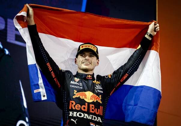 ABU DHABI - Red Bull Racing s Max Verstappen on the podium after winning the Formula 1 World Championship, WM, Weltmeisterschaft after the Abu Dhabi Grand Prix at Yas Marina Circuit on December 12, 2021 in Abu Dhabi, United Arab Emirates. REMKO DE WAAL F1 Grand Prix 2021 xVIxANPxSportx xxANPxIVx