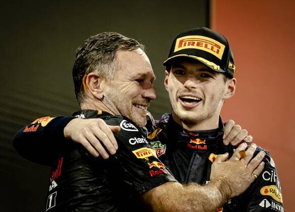 ABU DHABI -Team boss Christian Horner and Max Verstappen of Red Bull Racing on the podium after winning the Formula 1 World Championship, WM, Weltmeisterschaft after the Abu Dhabi Grand Prix at Yas Marina Circuit on December 12, 2021 in Abu Dhabi, United Arab Emirates. REMKO DE WAAL F1 Grand Prix 2021 xVIxANPxSportx xxANPxIVx
