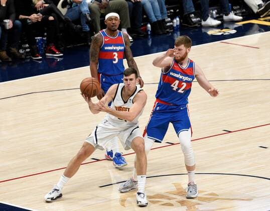 Vlatko Cancar (c) of the Nuggets fights to protect the ball against the forward of Davis Bertans (R) of the Wizards during a NBA, Basketball Herren, USA game at the Ball Arena in Denver, Colorado, USA, 13 December 2021. Washington Wizards at Denver Nuggets !ACHTUNG: NUR REDAKTIONELLE NUTZUNG!  Copyright: xToddxPiersonx AME4351 20211214-83fd992f8efbc0f6e9cf33bb3fd3e056cccdfb8c