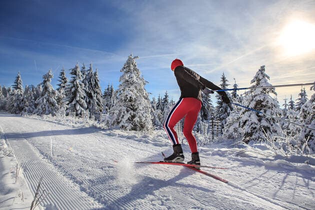 A man cross-country skiing on the forest trail,model released, Symbolfoto