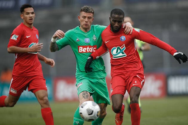 Ignacio Ramirez (AS Saint-Etienne) vs Zakari Souleymane (Lyon la Duchere) FOOTBALL : 32eme finale de la Coupe de France - Lyon La Duchere vs Saint-Etienne - 19 12 2021 AurelienMorissard Panoramic 
