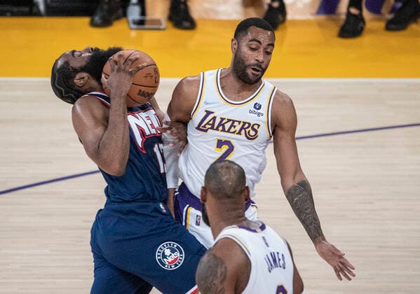 December 25, 2021, Los Angeles, California, USA: James Harden 13 of the Brooklyn Nets is blocked by Wayne Ellington 2 of the Los Angeles Lakers during their NBA, Basketball Herren, USA home game on Saturday December 25, 2021 at Crypto.com Arena in Los Angeles, California. Lakers lose to Nets, 115-122. PI Los Angeles USA - ZUMAp124 20211225_zaa_p124_002 Copyright: xJAVIERxROJASx