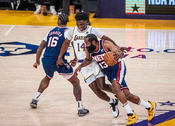 December 25, 2021, Los Angeles, California, USA: Stanley Johnson 14 of the Los Angeles Lakers tries to defend against James Harden 13 of the Brooklyn Nets during their NBA, Basketball Herren, USA home game on Saturday December 25, 2021 at Crypto.com Arena in Los Angeles, California. Lakers lose to Nets, 115-122. PI Los Angeles USA - ZUMAp124 20211225_zaa_p124_023 Copyright: xJAVIERxROJASx