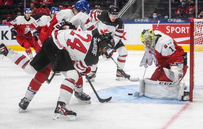 December 26, 2021, EDMONTON, AB, CANADA: Canada s Justin Sourdif (24) is stopped by Czech Republic s goalie Jakub Malek (1) during third period IIHF World Junior Hockey Championship action in Edmonton on Sunday, December 26, 2021. Justin Sourdif Jakub Malek  - ZUMAc35_ 20211226_zaf_c35_099 Copyright: xJasonxFransonx