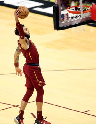 Cleveland Cavaliers Denzel Valentine45) dunks during the Cavs game against Toronto Raptors at Rocket Mortgage FieldHouse in Cleveland, Ohio on Sunday, December 26, 2021.  CLE20211226105 AARONxJOSEFCZYK
