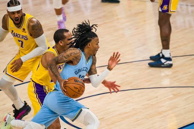 Grizzlies point guard Ja Morant (12) in the 1st half of the game against the Lakers, at FedEx Forum in Memphis, Tennessee, US, 29 December 2021. Lakers at Memphis Grizzlies Basketball !ACHTUNG: NUR REDAKTIONELLE NUTZUNG!  Copyright: xMATTHEWxA.xSMITHx AME6670 20211230-fcd3f26c2e70673ee2c5103910bdbd8dd7baa3a1