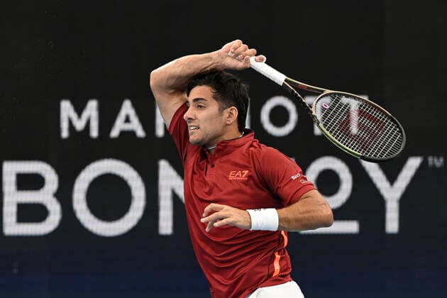 1st January 2022; Ken Rosewall Arena, Sydney, New South Wales, Australia; ATP, Tennis Herren Cup Australia, Sydney, Day 1 Chile versus Spain; Cristian Garin of Chile watches his forehand return to Roberto Bautista Agut of Spain  ActionPlus12351896 NigelxOwen