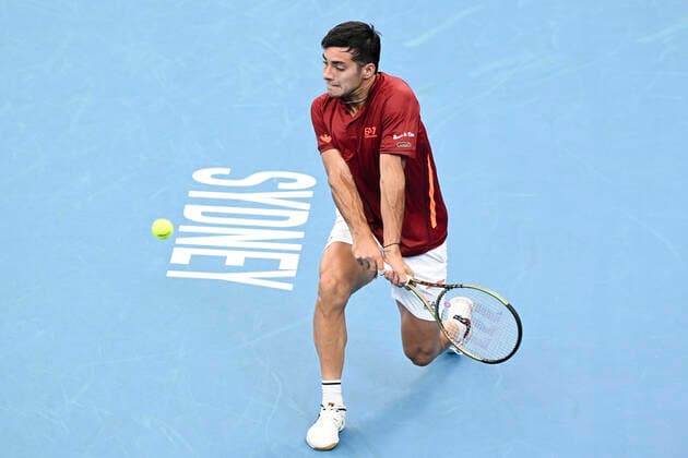 1st January 2022; Ken Rosewall Arena, Sydney, New South Wales, Australia; ATP, Tennis Herren Cup Australia, Sydney, Day 1 Chile versus Spain; Cristian Garin of Chile hits a backhand to Roberto Bautista Agut of Spain  ActionPlus12351920 NigelxOwen