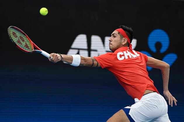 1st January 2022; Ken Rosewall Arena, Sydney, New South Wales, Australia; ATP, Tennis Herren Cup Australia, Sydney, Day 1 Chile versus Spain; Alejandro Tabilo of Chile stretches for a backhand to Pablo Carreno Busta of Spain  ActionPlus12351861 NigelxOwen