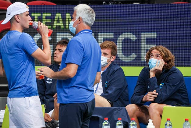 TENNIS ATP, Tennis Herren CUP, Stefanos Tsitsipas (R) of Team Greece reacts with team mates as his watches his father and team captain Apostolos Tsitsipas (C) talks with team mate Apostolos Tsitsipas during Day 1 of the ATP Cup tournament at Ken Rosewall Arena in Sydney, Saturday, January 1, 2022. ( NO ARCHIVING, EDITORIAL USE ONLY, NO USE IN BOOKS WITHOUT CONSENT SYDNEY NSW AUSTRALIA  Copyright: xDAVIDxGRAYx 20220101001610127098