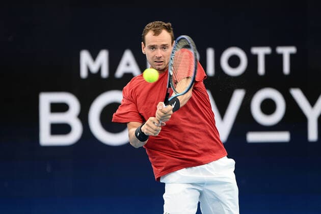 SYDNEY, AUSTRALIA - JANUARY 02: Roman Safiullin of Russia plays a backhand during the ATP, Tennis Herren Cup Tennis match between Roman Safiullin of Russia and Arthur Rinderknech of France at Ken Rosewall Arena on January 02, 2022 in Sydney, Australia. (Photo by Steven Markham Icon Sportswire) TENNIS: JAN 02 ATP Cup Sydney Icon2201020008