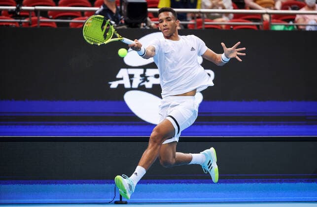 TENNIS ATP, Tennis Herren CUP, Felix Auger-Aliassime of Team Canada hits a shot during his match against Taylor Fritz of Team USA on day 2 of the ATP Cup tennis tournament at Qudos Arena in Sydney, Sunday, January 2, 2022. ( NO ARCHIVING, EDITORIAL USE ONLY, NO USE IN BOOKS WITHOUT CONSENT SYDNEY NSW AUSTRALIA  Copyright: xDAVIDxGRAYx 20220102001610282447