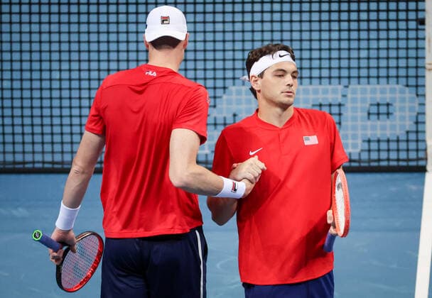 TENNIS ATP, Tennis Herren CUP, Taylor Fritz and John Isner (L) of Team USA talk celebrate after winning their doubles match against Denis Shapovalov and Felix Auger-Aliassime of Team Canada on day 2 of the ATP Cup tennis tournament at Qudos Arena in Sydney, Sunday, January 2, 2022. ( NO ARCHIVING, EDITORIAL USE ONLY, NO USE IN BOOKS WITHOUT CONSENT SYDNEY NSW AUSTRALIA  Copyright: xDAVIDxGRAYx 20220102001610291134