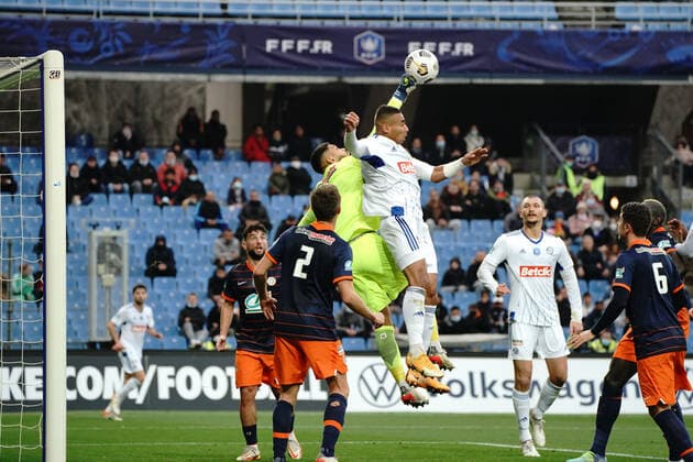 Alexander Djiku (Strasbourg) - Dimitry Bertaud (Montpellier FC) FOOTBALL : Montpellier vs Strasbourg - 16eme de finale de coupe de France - Montpellier - 02 01 2022 NorbertScanella Panoramic 