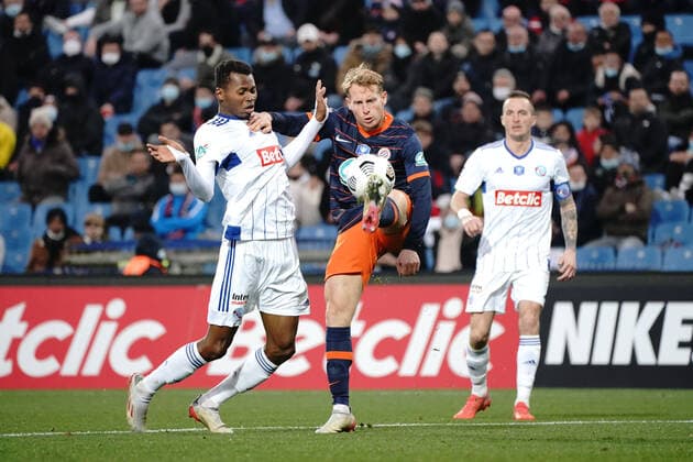 Nicolas Cozza (Montpellier FC) - Mouhamadou Habibou Diallo (Strasbourg) FOOTBALL : Montpellier vs Strasbourg - 16eme de finale de coupe de France - Montpellier - 02 01 2022 NorbertScanella Panoramic 