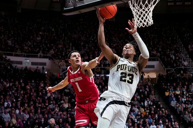 January 3, 2022: Purdue Boilermakers guard Jaden Ivey (23) drives to the basket past Wisconsin Badgers guard Johnny Davis (1) in the 2nd half of the game between the Wisconsin Badgers and the Purdue Boilermakers at Mackey Arena in West Lafayette, Indiana. Mandatory Credit: Sandra Dukes CSM. West Lafayette USA - ZUMAc04_ 20220103_zaf_c04_009 Copyright: xSandraxDukes xCalxSportxMediax