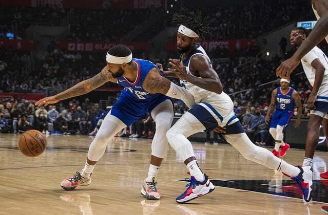 January 3, 2022, Los Angeles, California, USA: Marcus Morris 8 of the Los Angeles Clippers is defended by Patrick Beverley 22 of the Minnesota Timberwolves during their NBA, Basketball Herren, USA game on Monday January 3, 2022 at Crypto.com Arena in Los Angeles, California. Clippers lose to Timberwolves, 104-122. PI Los Angeles USA - ZUMAp124 20220103_zaa_p124_010 Copyright: xJAVIERxROJASx