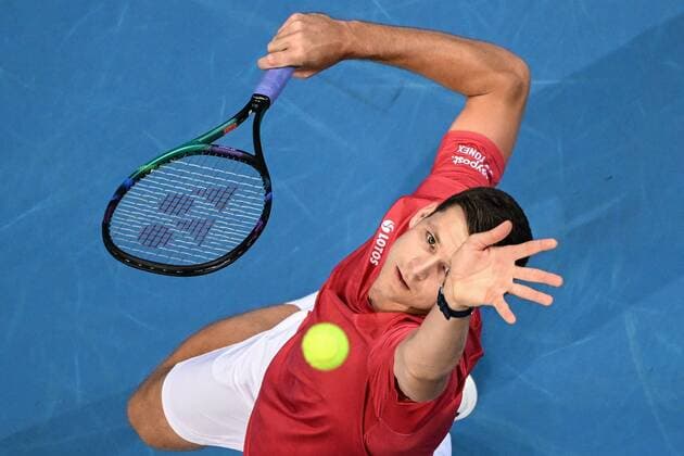 Mandatory Credit: Photo by James Gourley Shutterstock (12683878ae) Hubert Hurkacz of Team Poland serves during the ATP, Tennis Herren Cup Group Match against Team Argentina ATP Cup, Tennis, Qudos Bank Arena, Sydney, Australia - 05 Jan 2022 ATP Cup, Tennis, Qudos Bank Arena, Sydney, Australia - 05 Jan 2022  Copyright: xJamesxGourley Shutterstockx 12683878ae