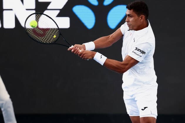 ADELAIDE, AUSTRALIA - JANUARY 05: Thiago Monteiro of Brazil hits a backhand during the ATP, Tennis Herren singles match between Thiago Monteiro of Brazil and Marin Cilic of Croatia on day three of the Adelaide International tennis tournament at Memorial Drive on January 05, 2022 in Adelaide, Australia. (Photo by Peter Mundy Speed Media Icon Sportswire) TENNIS: JAN 05 Adelaide International Icon220105176