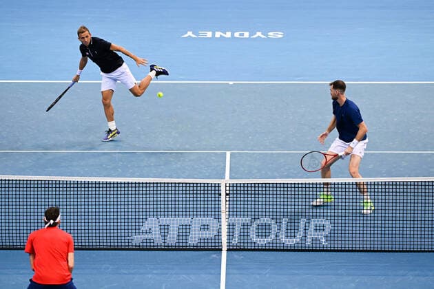 Mandatory Credit: Photo by James Gourley Shutterstock (12709936bv) Dan Evans and Jamie Murray of Team Great Britain in action during their doubles ATP, Tennis Herren Cup Group Match against Team USA ATP Cup, Tennis, Qudos Bank Arena, Sydney, Australia - 06 Jan 2022 ATP Cup, Tennis, Qudos Bank Arena, Sydney, Australia - 06 Jan 2022  Copyright: xJamesxGourley Shutterstockx 12709936bv