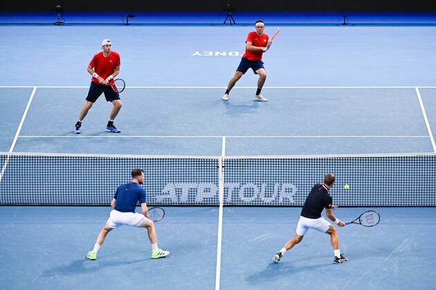 Mandatory Credit: Photo by James Gourley Shutterstock (12709936bx) John Isner and Taylor Fritz of Team USA in action during their doubles ATP, Tennis Herren Cup Group Match against Dan Evans and Jamie Murray of Team Great Britain ATP Cup, Tennis, Qudos Bank Arena, Sydney, Australia - 06 Jan 2022 ATP Cup, Tennis, Qudos Bank Arena, Sydney, Australia - 06 Jan 2022  Copyright: xJamesxGourley Shutterstockx 12709936bx