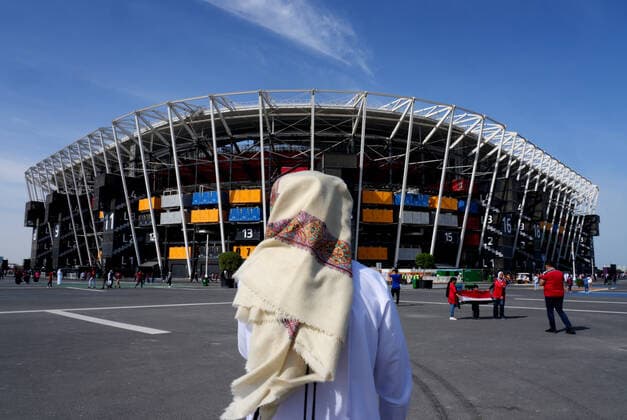 FIFA FuÃŸball WM 2022, SportstÃ¤tten, Stadium 974 General view a person wearing Emirati attire outside the Stadium 974 in Doha, Qatar. Taken during the FIFA Arab Cup in the build up to the 2022 FIFA World Cup, WM, Weltmeisterschaft, Fussball Photo by 18 12 2021  Copyright: xx