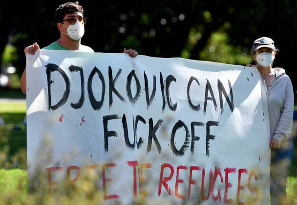 TENNIS NOVAK DJOKOVIC VISA, Pro-refugee activists carry banners outside outside the Park hotel quarantine facility where it is believed Serbian tennis player Novak Djokovic is being detained in Melbourne, Friday, January 7, 2022. World No.1 tennis star Novak Djokovic is fighting his visa cancellation and pending deportation in a Federal Court challenge. ( NO ARCHIVING, EDITORIAL USE ONLY, NO USE IN BOOKS WITHOUT CONSENT MELBOURNE VIC AUSTRALIA  Copyright: xJOELxCARRETTx 20220107001611458665