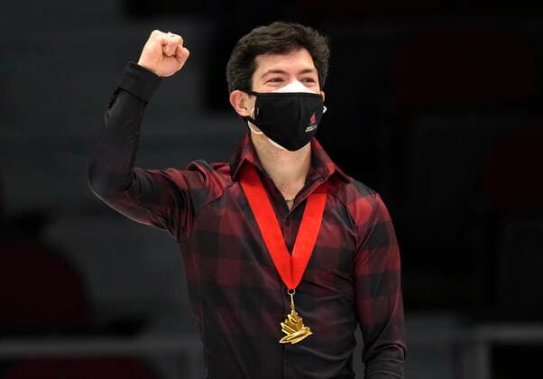 January 8, 2022, Ottawa, ON, Canada: Keegan Messing pumps his fist after receiving his gold medal at the National Skating Championships, Saturday, Jan. 8, 2022 in Ottawa. Keegan Messing  - ZUMAc35_ 20220108_zaf_c35_159 Copyright: xAdrianxWyldx