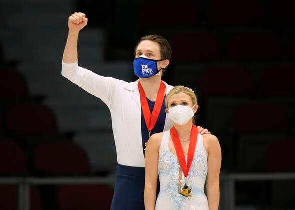 January 8, 2022, Ottawa, ON, Canada: Kirsten Moore-Towers and Michael Marinaro stand on the podium after receiving their gold medals during a medal ceremony at the National Skating Championships, Saturday, Jan. 8, 2022 in Ottawa. Kirsten Moore-Towers Michael Marinaro  - ZUMAc35_ 20220108_zaf_c35_165 Copyright: xAdrianxWyldx