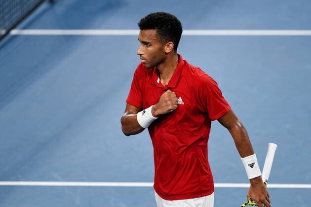 SYDNEY, AUSTRALIA - JANUARY 09: FÃ lix Auger-Aliassime of Canada pumps his chest during the ATP, Tennis Herren Cup Tennis Final match between FÃ lix Auger-Aliassime of Canada and Roberto Bautista Agut of Spain at Ken Rosewall Arena on January 09, 2022 in Sydney, Australia. (Photo by Steven Markham Icon Sportswire) TENNIS: JAN 09 ATP Cup Sydney Icon2201090118