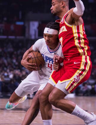 January 9, 2022, Los Angeles, California, USA: Brandon Boston Jr. 4 of the Los Angeles Clippers bumps into Timothe Luwawu-Cabarrot 7 of the Atlanta Hawks during their NBA, Basketball Herren, USA game on Sunday January 9, 2022 at Crypto.com Arena in Los Angeles, California. Clippers defeat Hawks, 106-93. ARIANA RUIZ PI Los Angeles USA - ZUMAp124 20220109_zaa_p124_007 Copyright: xArianaxRuizx