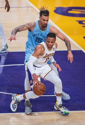 January 9, 2022, Los Angeles, California, USA: Russell Westbrook 0 of the Los Angeles Lakers is defended by Brandon Clarke 15 of the Memphis Grizzlies during their NBA, Basketball Herren, USA game on Sunday January 9, 2022 at Crypto.com Arena in Los Angeles, California. PI Los Angeles USA - ZUMAp124 20220109_zaa_p124_027 Copyright: xJAVIERxROJASx