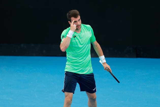 Pedro Martinez of Spain points to his head after defeating Alexei Popyrin of Australia in the first round during the Sydney Tennis Classic 2022 at Sydney Olympic Park Tennis Centre, Sydney, Australia on 11 January 2022. Copyright: xPeterxDovganx 30470081