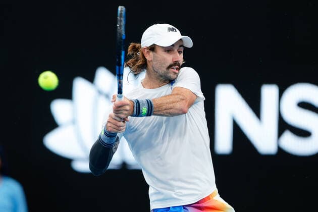 Jordan Thompson of Australia plays a backhand against Reilly Opelka of USA during the Round of 16 match at the Sydney Tennis Classic 2022 at Sydney Olympic Park Tennis Centre, Sydney, Australia on 12 January 2022. Copyright: xPeterxDovganx 30470272