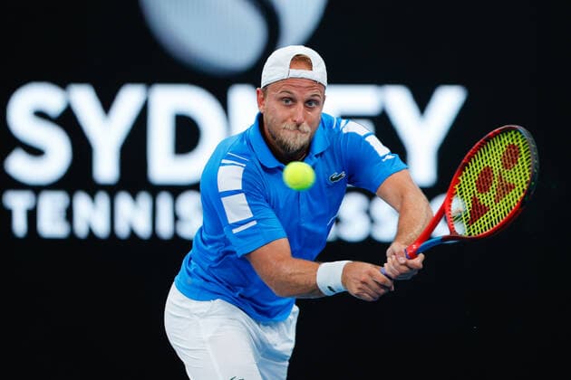 Denis Kudla of USA hits a backhand against David Goffin of Belgium during the Sydney Tennis Classic 2022 at Sydney Olympic Park Tennis Centre, Sydney, Australia on 12 January 2022. Copyright: xPeterxDovganx 30470297