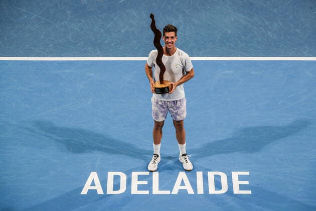 ADELAIDE INTERNATIONAL 2 FINAL, Thanasi Kokkinakis of Australia celebrates victory with the trophy after the match against Arthur Rinderknech of France during the Adelaide International 2 Mens Final in Adelaide, Saturday, January 15, 2022. ( NO ARCHIVING, EDITORIAL USE ONLY, NO USE IN BOOKS WITHOUT CONSENT ADELAIDE SA AUSTRALIA  Copyright: xMATTxTURNERx 20220115001613573987