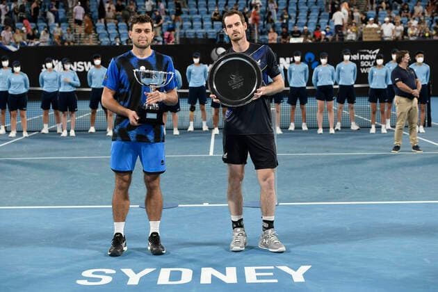 15th January 2022: Ken Rosewall Arena, Sydney Olympic Park, Sydney, Australia; Sydney Tennis Classic, Day 7 Mens Final: winner Aslan Karatsev of Russia and runner up Andy Murray of Great Britain pose with their trophies  ActionPlus12356278 NigelxOwen