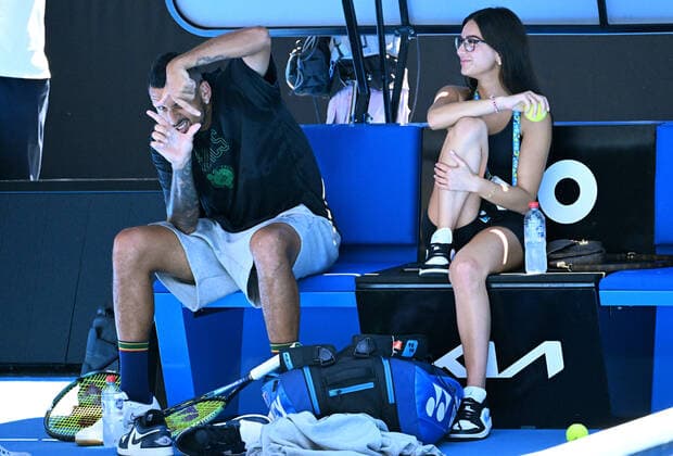 Sport Bilder des Tages TENNIS AUSTRALIAN OPEN PRACTICE, Nick Kyrgios of Australia reacts to photographers while sitting with girlfriend Costeen Hatzi during a practice session ahead of the Australian Open, at Melbourne Park in Melbourne, Sunday, January 16, 2022. ( NO ARCHIVING, EDITORIAL USE ONLY, NO USE IN BOOKS WITHOUT CONSENT MELBOURNE VIC AUSTRALIA  Copyright: xDAVExHUNTx 20220116001613837079