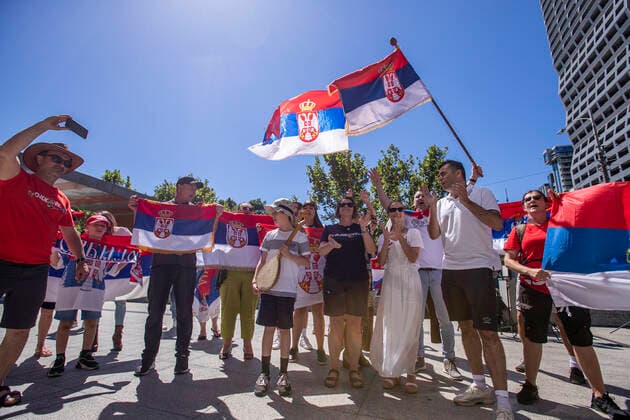 (220116) -- MELBOURNE, Jan. 16, 2022 -- Fans of Novak Djokovic gather outside Federal Court of Australia, in Melbourne, Australia on Jan. 16, 2022. Australia s Federal Court on Jan. 16, 2022 dismissed the world No. 1 s application to have his visa cancelation overturned one day before the start of the Australian Open, in which Djokovic had been expected to defend his title. ) (SP)AUSTRALIA-MELBOURNE-TENNIS-DJOKOVIC BaixXuefei 